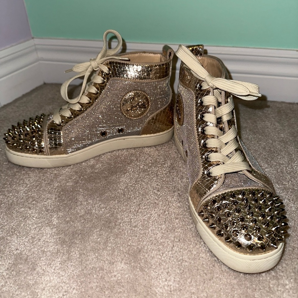 Gold and silver spiked Louboutin sneakers